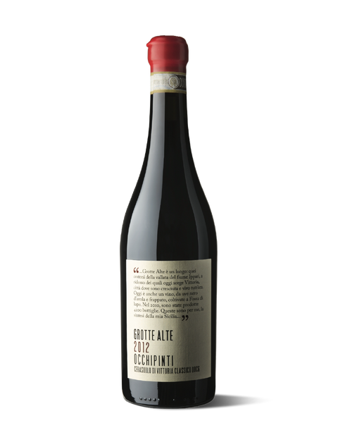 photograph of wine bottle with wax seal