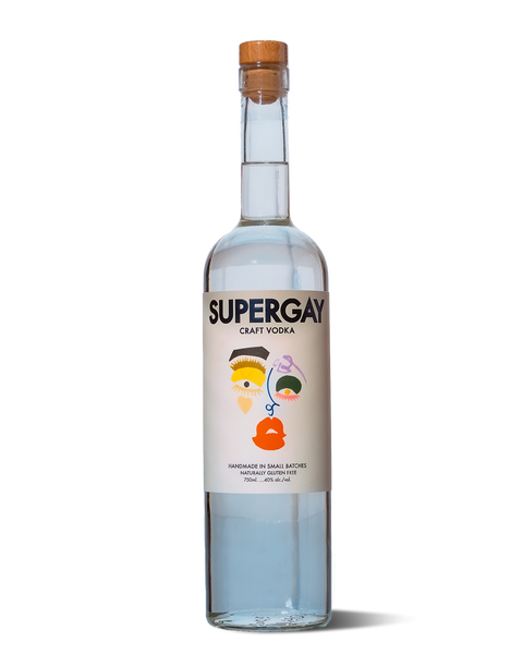 photograph of clear bottle of spirits