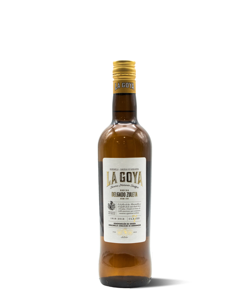 photograph of short wine bottle