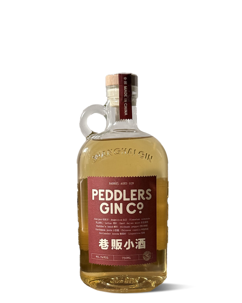 photograph of a bottle short and squat